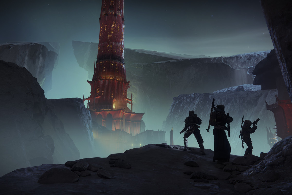 Guardians look at the spooky, scarlet keep in Destiny 2: Shadowkeep