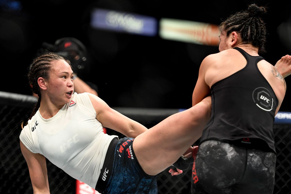 Michelle Waterson of the United States kicks Carla Esparza of the United States in the Women’s strawweight fight during UFC 249 at VyStar Veterans Memorial Arena on May 9, 2020 in Jacksonville, Florida.