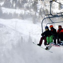 Skiers and snowboarders ride the lift during opening day at Brighton Resort on Friday, Nov. 25, 2016. With recent snowfall combined with extensive snowmaking, Brighton has a base averaging between 10-20 inches on 3 runs serviced by 2 lifts.