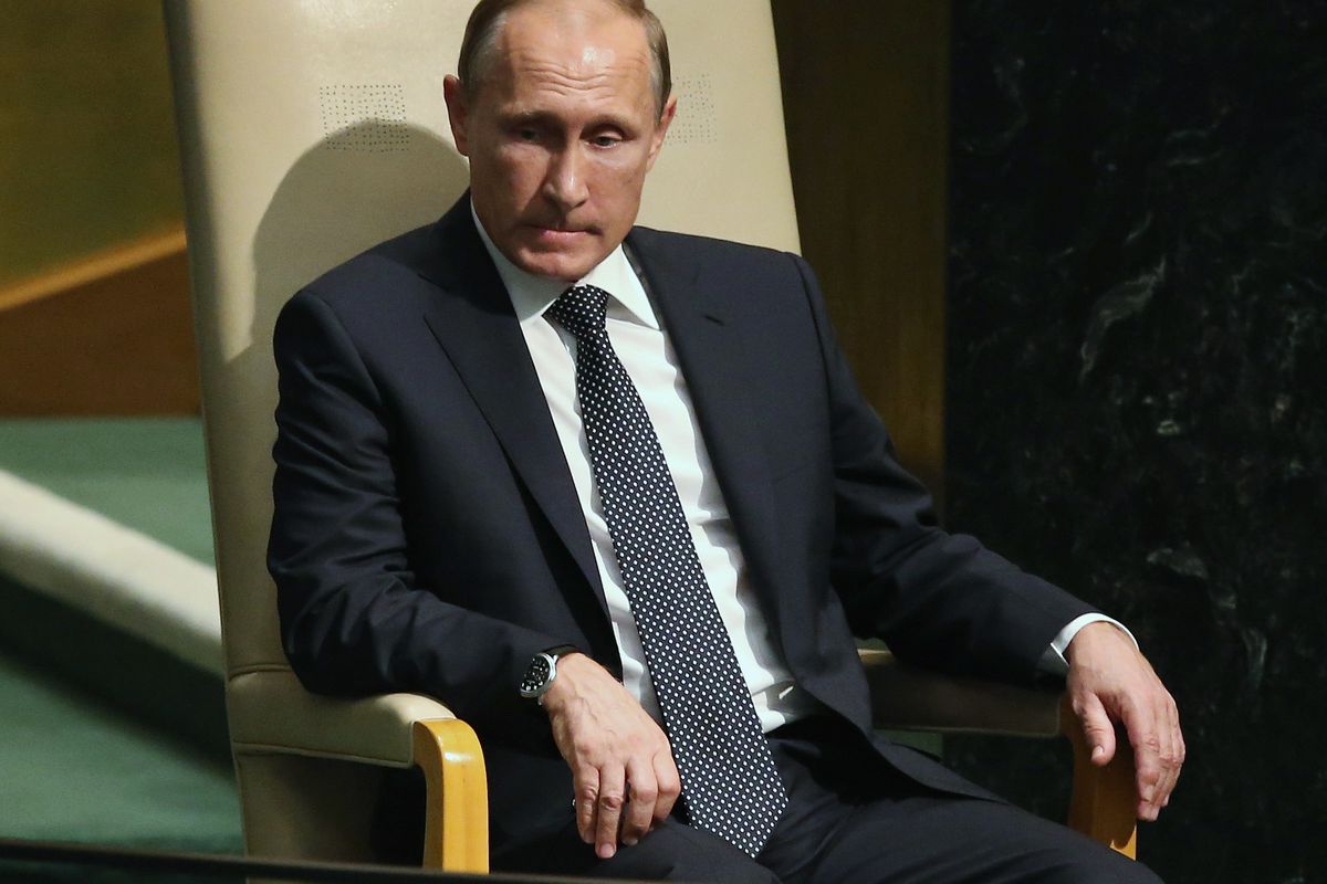 Russian President Vladimir Putin waits to speak at the United Nations.