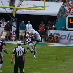 Dec. 15, 2013 Miami Gardens, FL - Miami Dolphins wide receiver Mike Wallace (11) receives a pass in the second quarter of the team's Week 15 game against the New England Patriots.  Wallace would score a touchdown on the play.