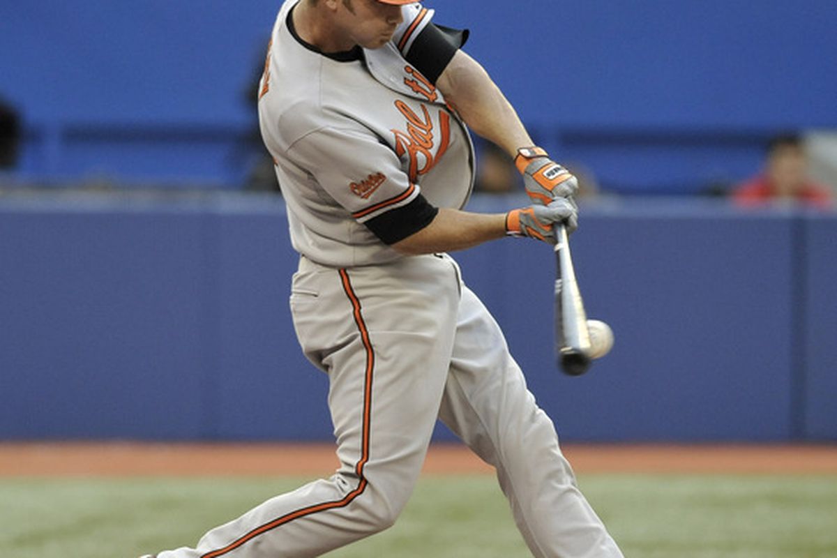 TORONTO, CANADA - JULY 27:  J.J. Hardy #2 of the Baltimore Orioles bats during MLB game action against the Toronto Blue Jays July 27, 2011 at Rogers Centre in Toronto, Ontario, Canada. (Photo by Brad White/Getty Images)