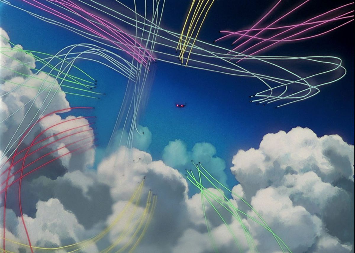 A multi-colored barrage of homing missiles converging on a solitary fighter jet in Macross Plus.
