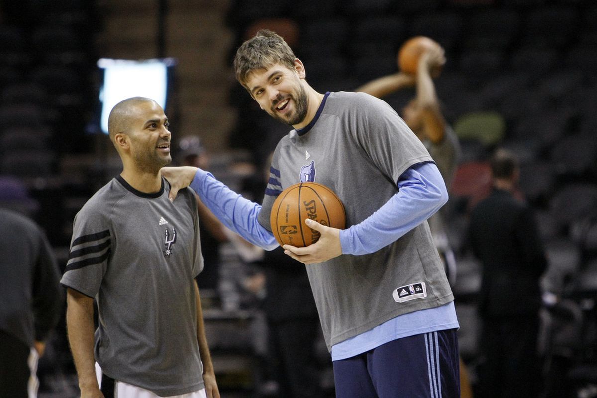 Apr 12, 2012; San Antonio, TX, USA; San Antonio Spurs guard Tony Parker (left) and Memphis Grizzlies center Marc Gasol (right) share a laugh before the game at the AT&T Center. Mandatory Credit: Soobum Im-US PRESSWIRE