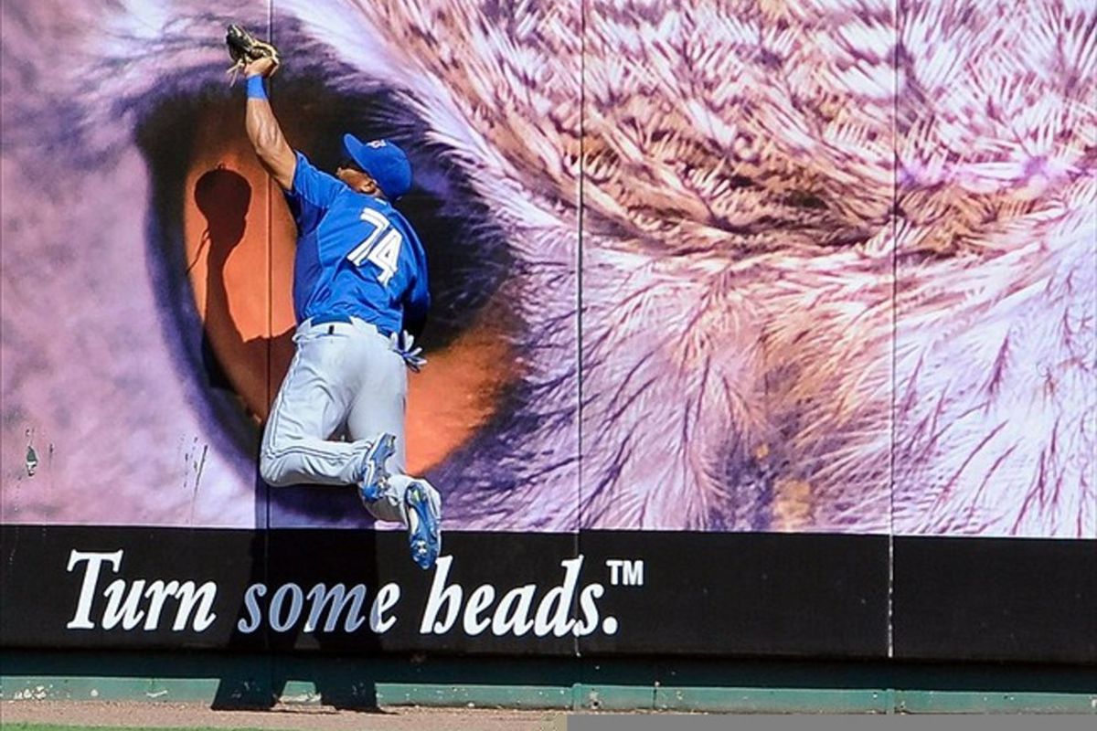 Mar 4, 2012; Bradenton, FL, USA: Who? Blue Jays RF Moises Sierra (74) eyes a Jake Fox fly ball and secures it in his talons. Mandatory Credit: Jerome Miron-US PRESSWIRE