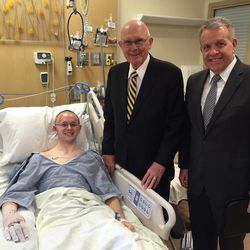 Mason Wells, left, one of four Mormon missionaries wounded March 22, 2016, in the Brussels airport terrorist attack, smiles during a visit with Elder Dallin H. Oaks of the Quorum of the Twelve Apostles and Elder Brent H. Nielson, executive director of the Missionary Department of The Church of Jesus Christ of Latter-day Saints, at the University of Utah burn center on Wednesday, March 30, 2016.