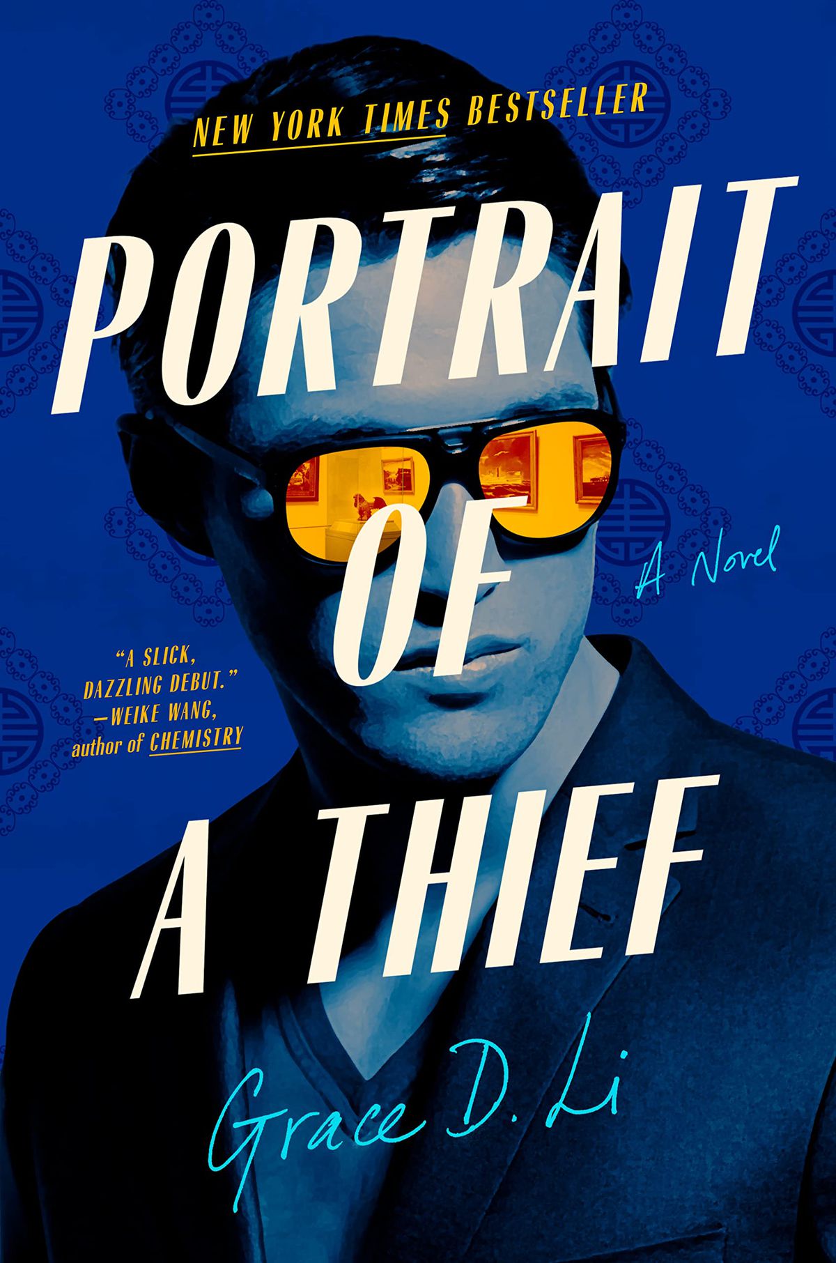 The cover of Portrait of a Thief, which depicts a portrait of an Asian, with a blue stain and bright orange reflective sunglasses.