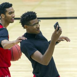 Utah forward Chris Seeley films a teammate as Gabe Bealer tries to mess up his framing after a practice at the Jon M. & Karen Huntsman Basketball Facility in Salt Lake City on Thursday, Oct. 6, 2016. The Runnin' Utes open its season on Nov. 12 against Northwest Nazarene.