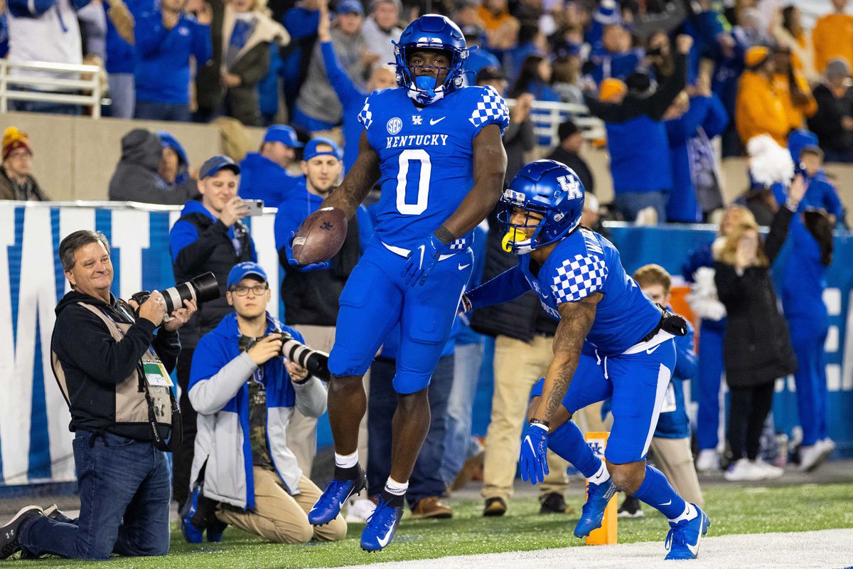 Kentucky Wildcats running back Kavosiey Smoke and wide receiver Wan’Dale Robinson celebrate a touchdown during the first quarter against the Tennessee Volunteers at Kroger Field.