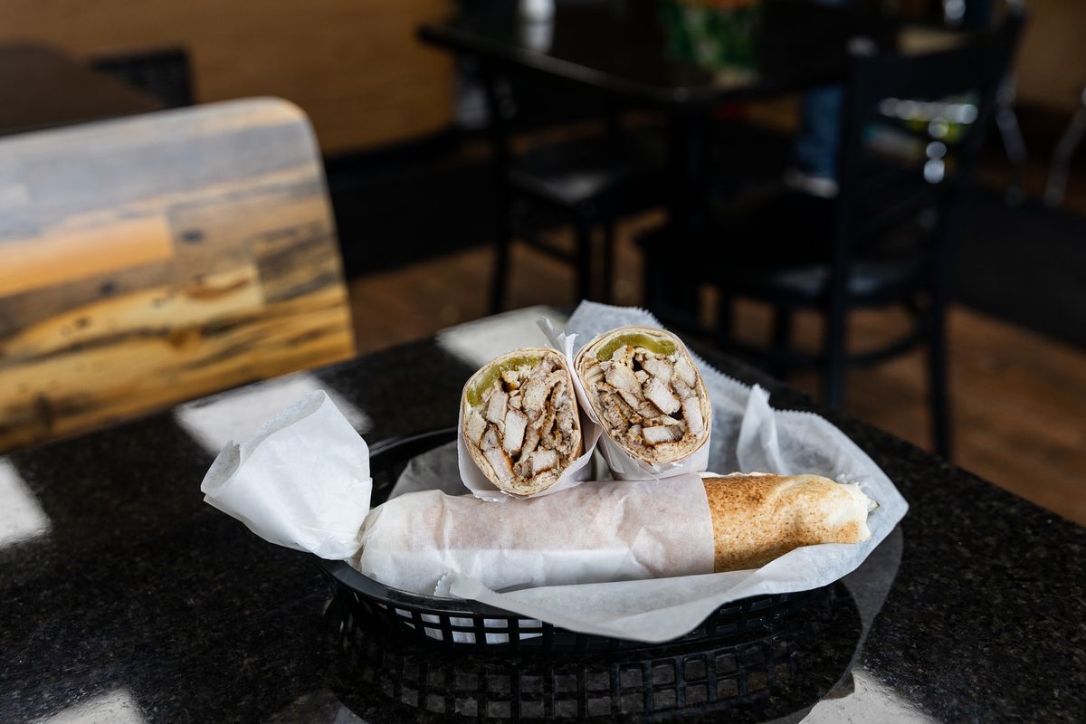 Chicken shawarma at Tuhama’s in Dearborn sits in a black basket lined with white paper.