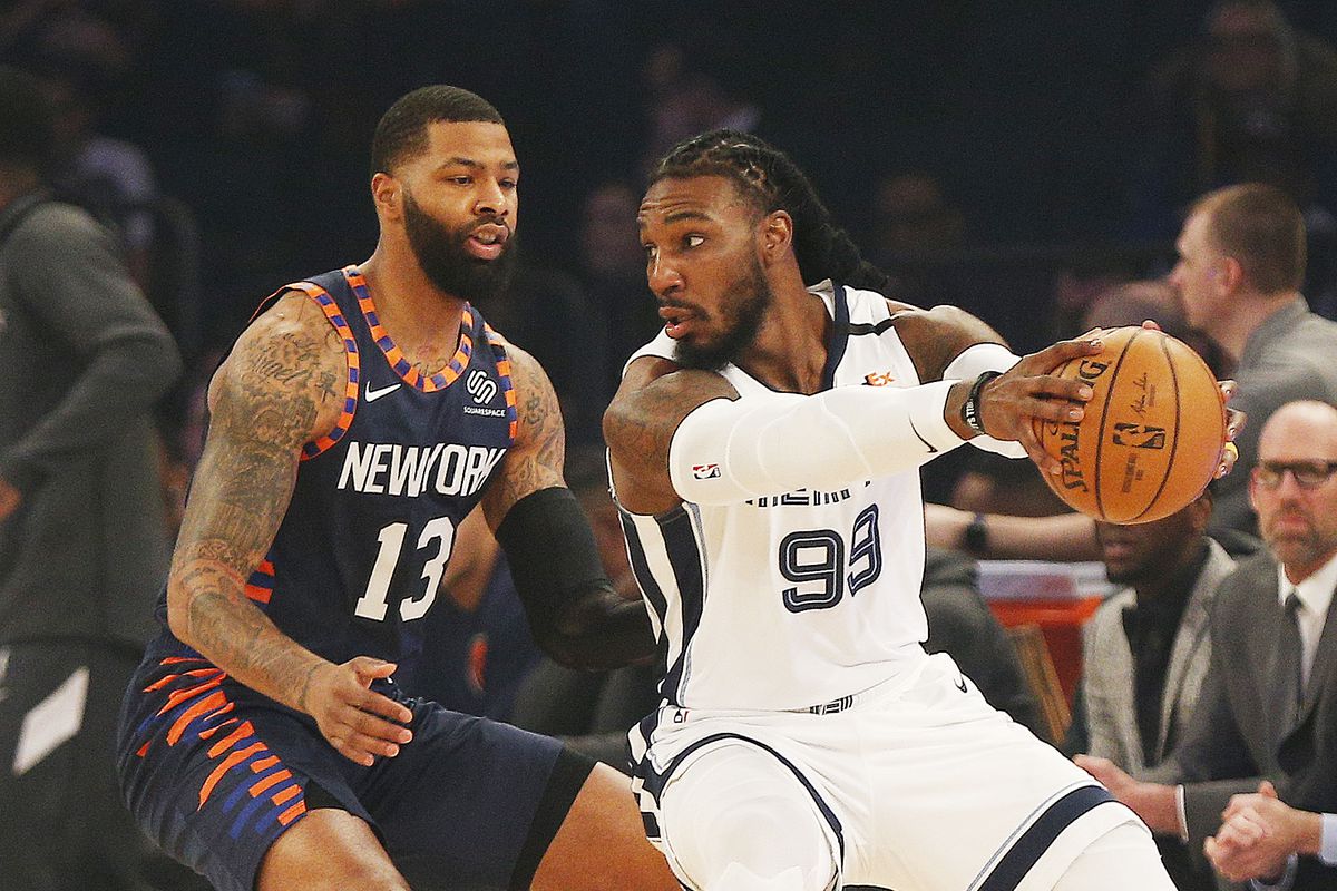 Memphis Grizzlies forward Jae Crowder dribbles the ball against New York Knicks forward Marcus Morris Sr. during the first half at Madison Square Garden.