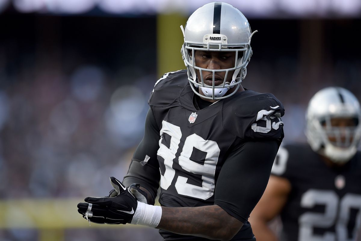 Aldon Smith of the Oakland Raiders looks on during a timeout against the Minnesota Vikings in the third quarter of their NFL football game at O.co Coliseum on November 15, 2015 in Oakland, California.