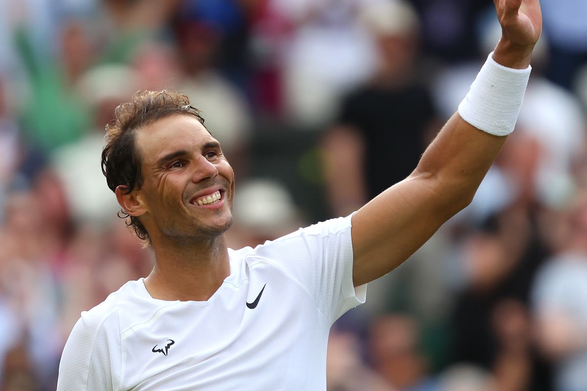 Rafael Nadal of Spain acknowledges the crowd following their victory against Taylor Fritz of The United States after their Men’s Singles Quarter Final match on day ten of The Championships Wimbledon 2022 at All England Lawn Tennis and Croquet Club on July 06, 2022 in London, England.
