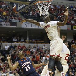 Indiana forward Noah Vonleh (1) blocks a shot by Illinois guard Tracy Abrams (13) in the first half of an NCAA college basketball game in the first round of the Big Ten Conference tournament Thursday, March 13, 2014, in Indianapolis. (AP Photo/Kiichiro Sato)
