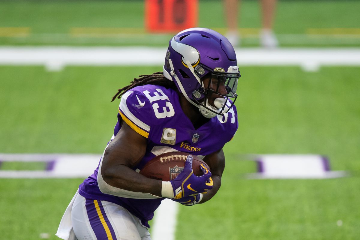 Minnesota Vikings running back Dalvin Cook runs with the ball in the second quarter against the Detroit Lions at U.S. Bank Stadium.