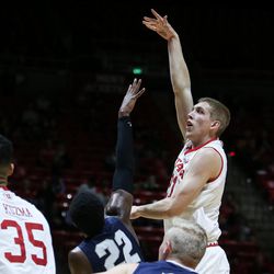 Utah forward Tyler Rawson shoots over Concordia’s Christopher Edward during a game at the Hunstman Center in Salt Lake City on Tuesday, Nov. 15, 2016.