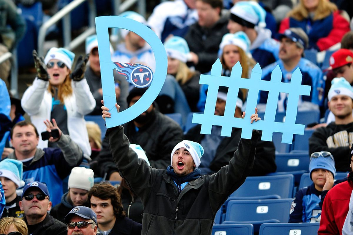 NASHVILLE, TN - DECEMBER 24:  A Tennessee Titans fan cheers during a game against the Jacksonville Jaguars at LP Field on December 24, 2011 in Nashville, Tennessee. The Titans won 23-17.  (Photo by Grant Halverson/Getty Images)