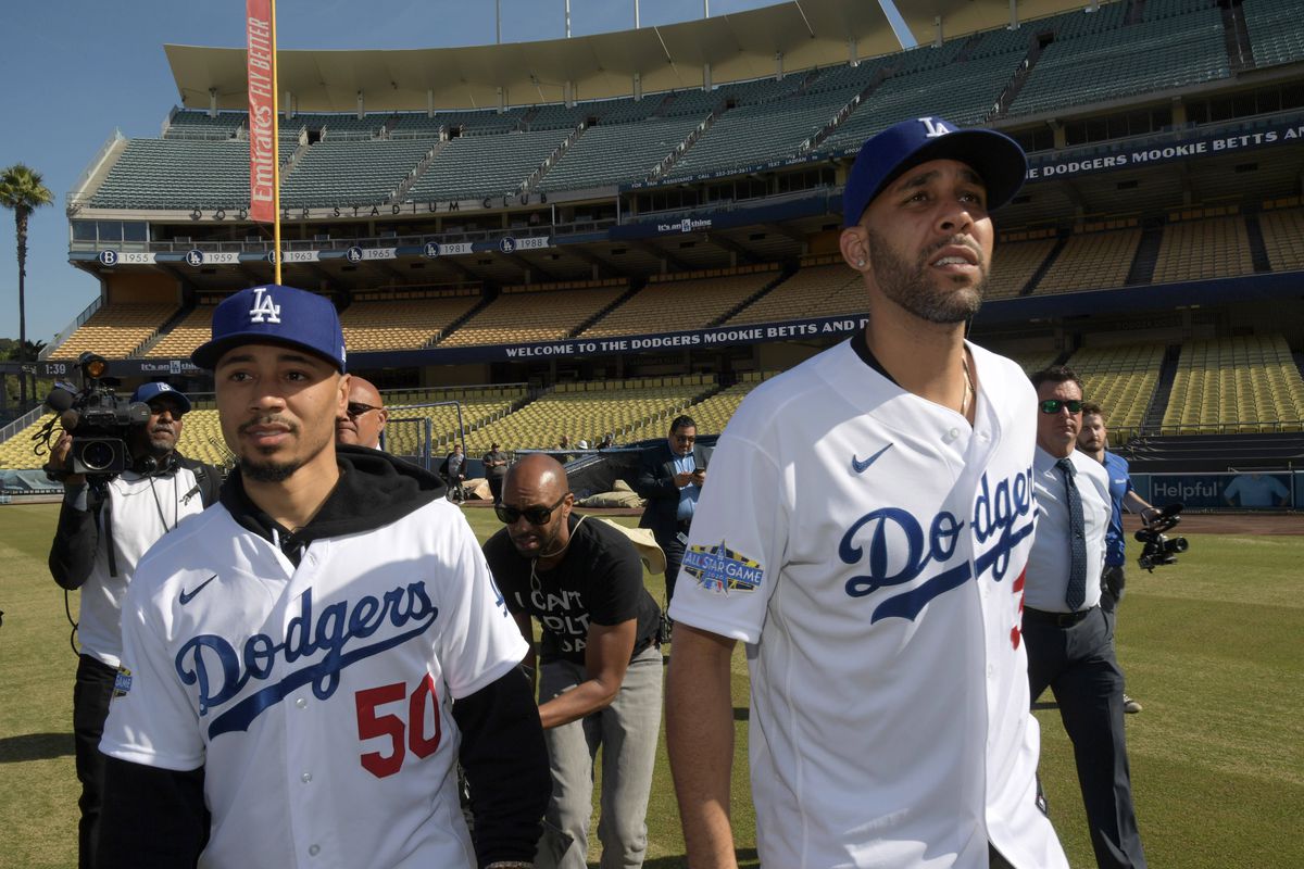 Newly acquired Los Angeles Dodgers players Mookie Betts and David Price tour Dodger Stadium after a press conference.