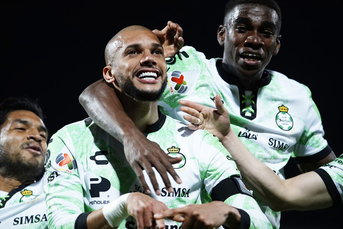 Matheus Doria of Santos celebrates after scoring his team’s second goal during the 5th round match between Santos Laguna and America as part of the Torneo Grita Mexico C22 Liga MX at Corona Stadium on February 12, 2022 in Torreon, Mexico.