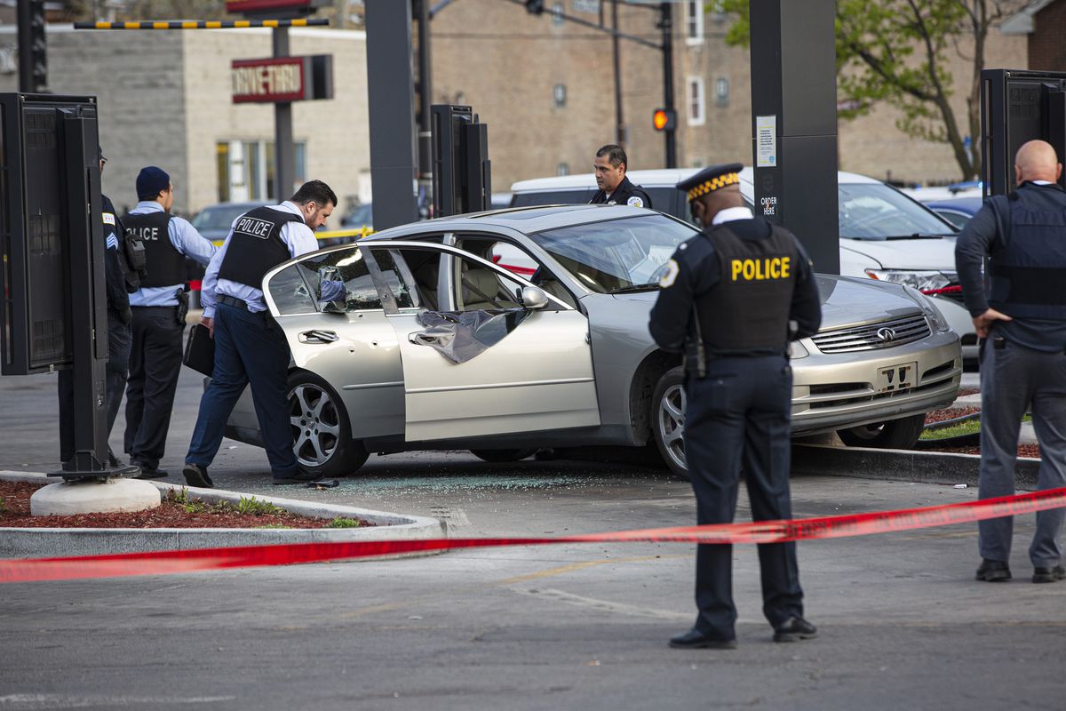 Police investigate a crime scene where Jontae Adams, 28, and his daughter, Jaslyn, 7, where shot at resulting in Jaslyn’s death at a McDonald’s drive thru at the corner of W Roosevelt Rd and South Kedzie Ave in Lawndale, Sunday, April 18, 2021. | Anthony&nbsp;Vazquez/Sun-Times
