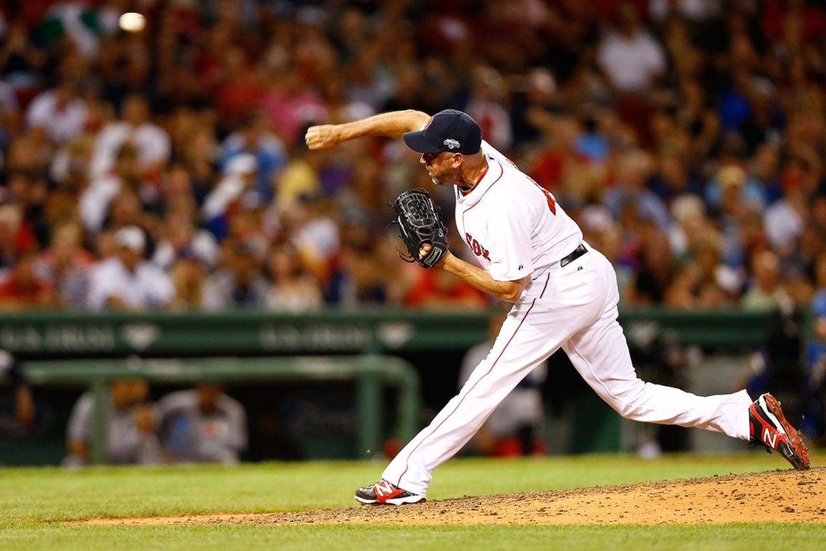 BOSTON, MA:  Scott Atchison #48 of the Boston Red Sox pitches against the New York Yankees during the game at Fenway Park in Boston, Massachusetts.  (Photo by Jared Wickerham/Getty Images)