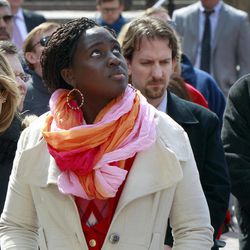 Audrey Gasteier, left, of Cambridge, Mass., and Aminata Ndiaye, center, of Boston, join others to observe a minute of silence at City Hall Plaza in Boston for the victims of the Boston Marathon bombings Monday, April 22, 2013, one week after the explosions. The remembrance was held at 2:50 p.m., the time the first of the two bombs exploded near the race's finish line. 