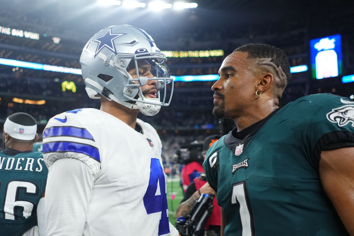 Dak Prescott #4 of the Dallas Cowboys speaks with Jalen Hurts #1 of the Philadelphia Eagles after an NFL game at AT&amp;T Stadium on September 27, 2021 in Arlington, Texas.