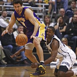 Laker Sasha Vujacic steals the ball from Jazz forward C.J. Miles at EnergySolutions Arena on Wednesday. Los Angeles won 96-81.