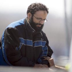 Chiheb Esseghaier, one of two suspects accused of plotting with al-Qaida in Iran to derail a train in Canada, arrives at Buttonville Airport just north of Toronto, on Tuesday, April 23, 2013. Canadian investigators say Raed Jaser, 35, and his suspected accomplice Esseghaier, 30, received "directions and guidance" from members of al-Qaida in Iran. In a brief court appearance in Montreal Tuesday, Esseghaier declined to be represented by a court-appointed lawyer. He made a brief statement in French in which he called the allegations against him unfair. 