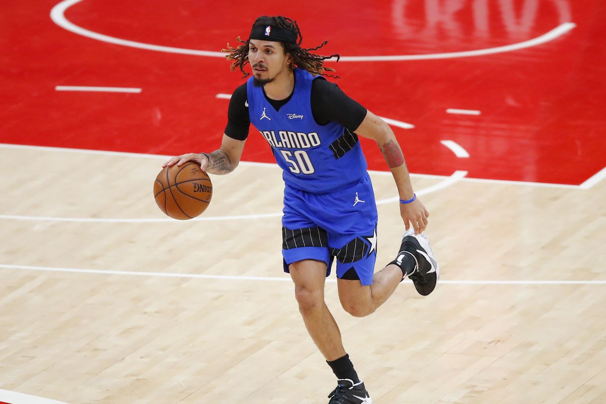 Cole Anthony of the Orlando Magic drives downcourt during the first half against the Atlanta Hawks at State Farm Arena on May 13, 2021 in Atlanta, Georgia.&nbsp;