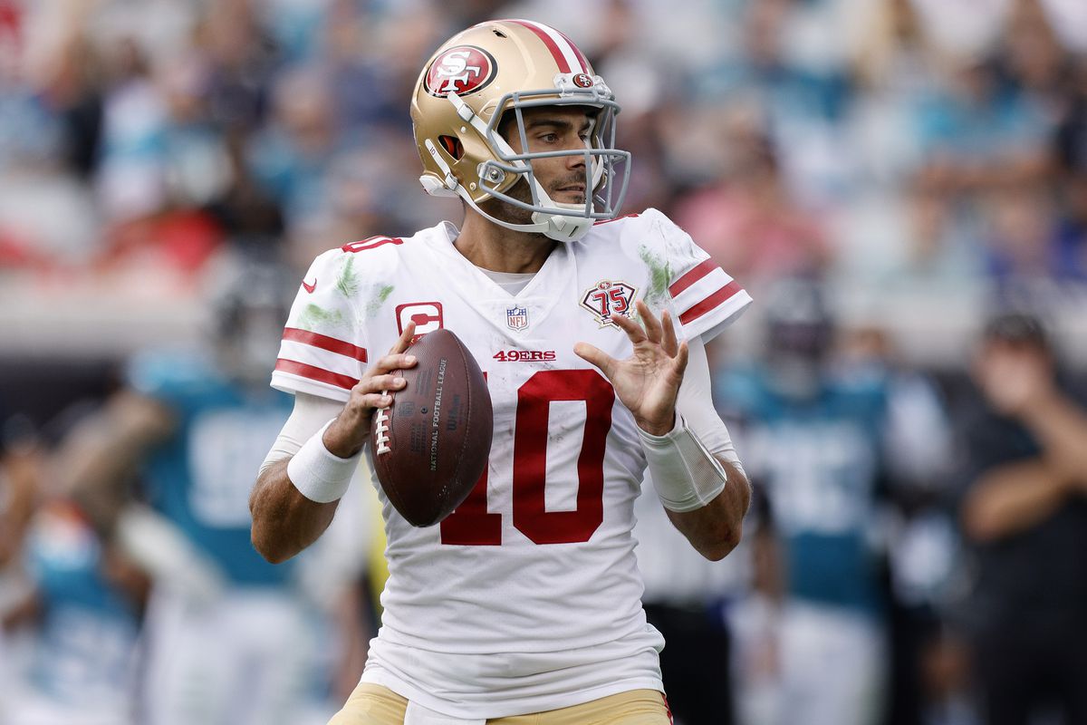 Jimmy Garoppolo #10 of the San Francisco 49ers looks to throw the ball during the second quarter against the Jacksonville Jaguars at TIAA Bank Field on November 21, 2021 in Jacksonville, Florida.