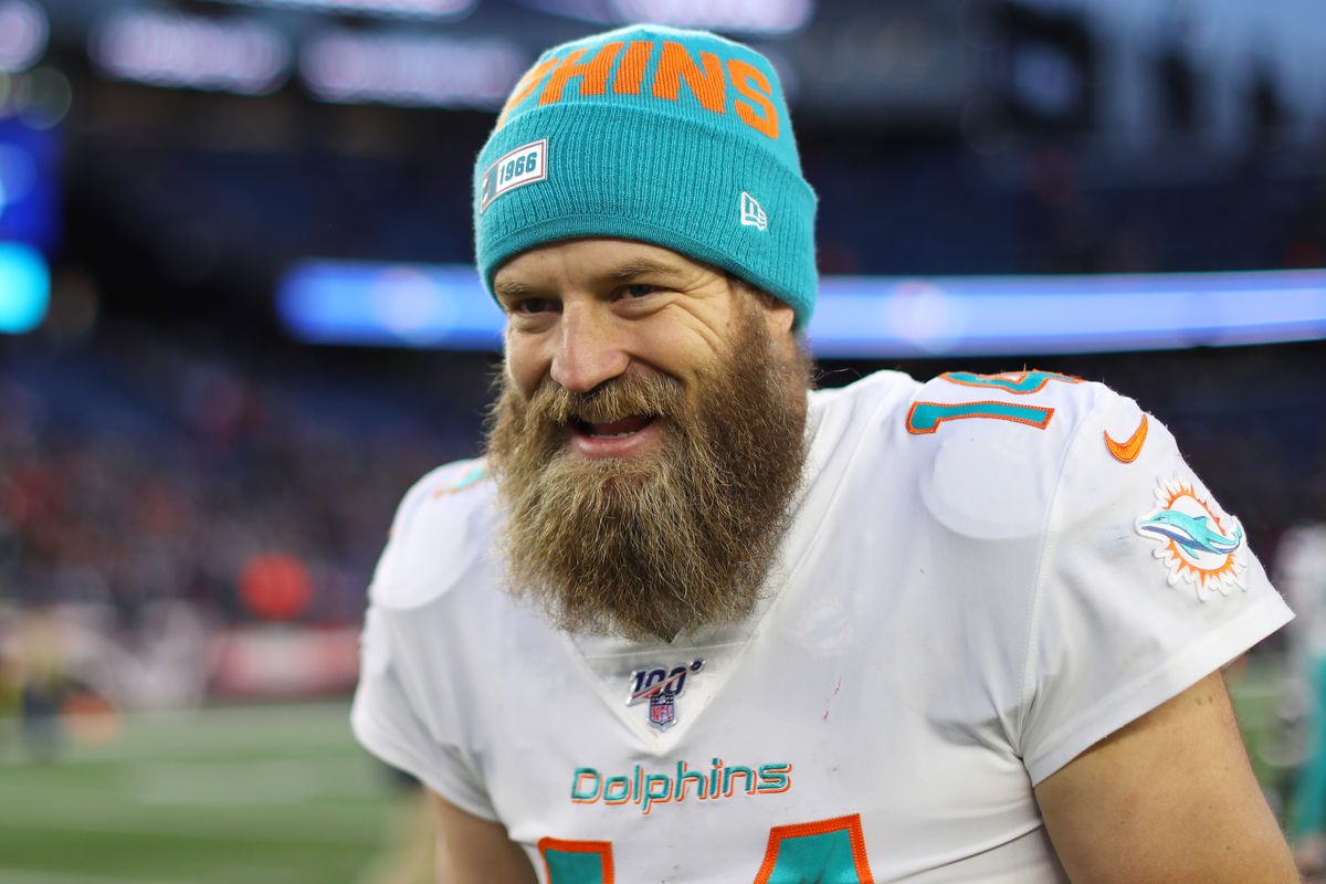 Ryan Fitzpatrick of the Miami Dolphins smiles as he leaves the field after the game against the New England Patriots at Gillette Stadium on December 29, 2019 in Foxborough, Massachusetts.