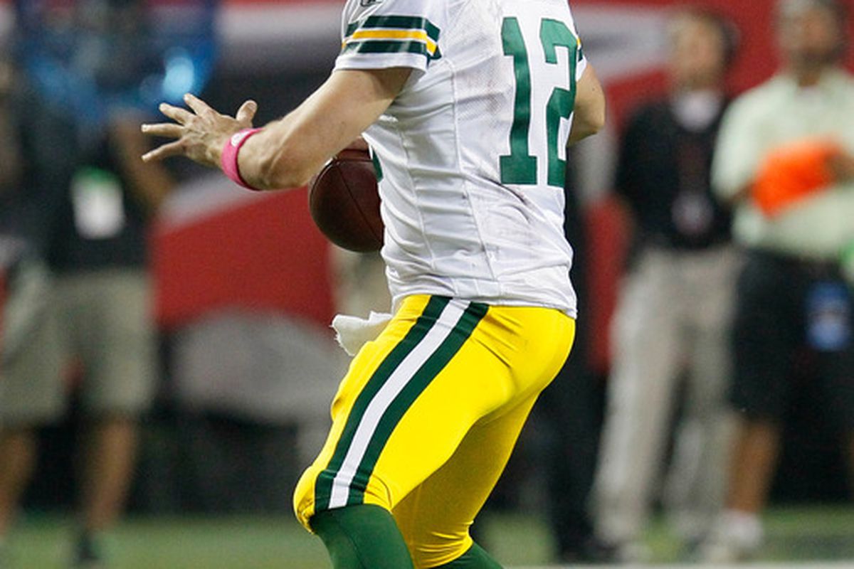 ATLANTA, GA - OCTOBER 09:  Aaron Rodgers #12 of the Green Bay Packers looks to pass against the Atlanta Falcons at Georgia Dome on October 9, 2011 in Atlanta, Georgia.  (Photo by Kevin C. Cox/Getty Images)