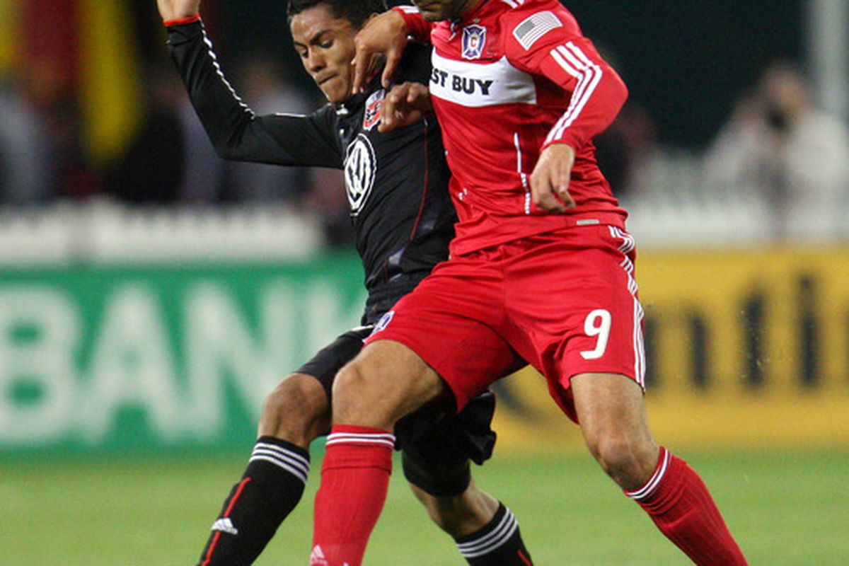 WASHINGTON - APRIL 17: Baggio Husidic #9 of Chicago Fire fights for the ball against Andy Najar #14 of D.C. United at RFK Stadium on April 17, 2010 in Washington, DC. (Photo by Ned Dishman/Getty Images)
