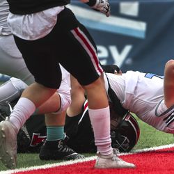Sky View quarterback Kason Carlsen stretches for the end zone during the 4A state championship football game between Sky View and Park City at Rice-Eccles Stadium in Salt Lake City on Friday, Nov. 22, 2019. Carlsen came up just short of the goal line.