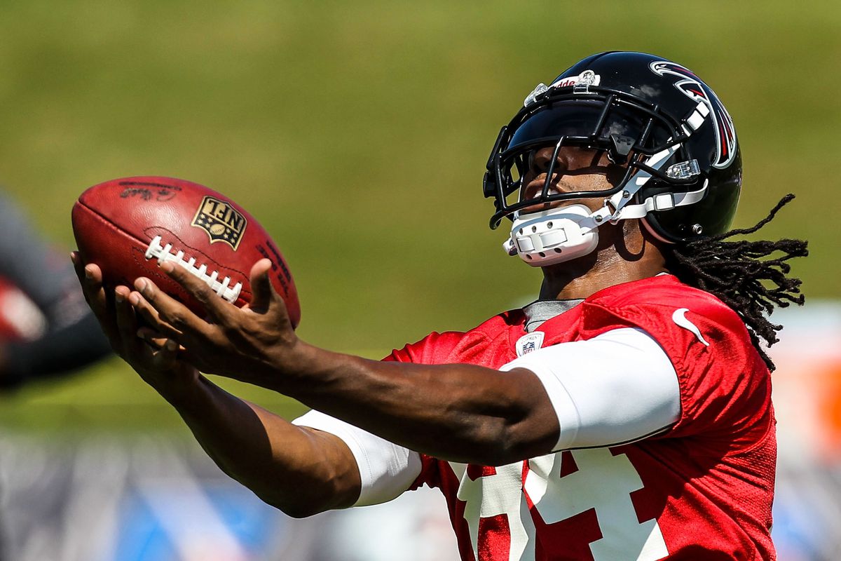 July 27, 2012; Flowery Branch, GA, USA; Atlanta Falcons wide receiver Roddy White (84) catches a pass during training camp at the Atlanta Falcons Training Facility. Mandatory Credit: Daniel Shirey-US PRESSWIRE