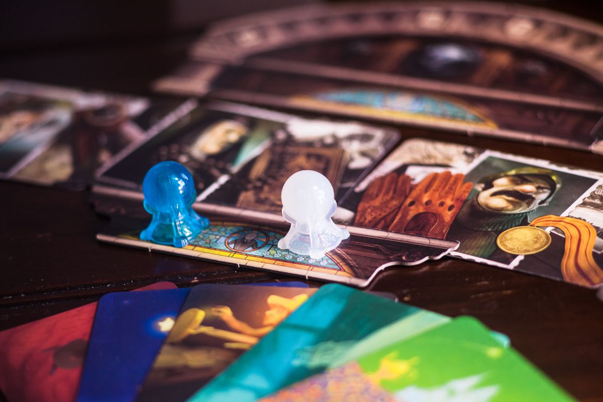 In Mysterium, one player acts as a mute ghost delivering visions, while the rest act as psychics trying to interpret those visions.