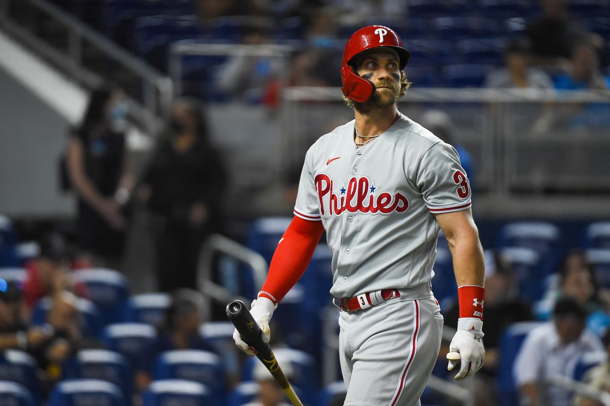 Bryce Harper #3 of the Philadelphia Phillies walks back to the dugout after striking out during the first inning against the Miami Marlins at loanDepot park on October 01, 2021 in Miami, Florida.