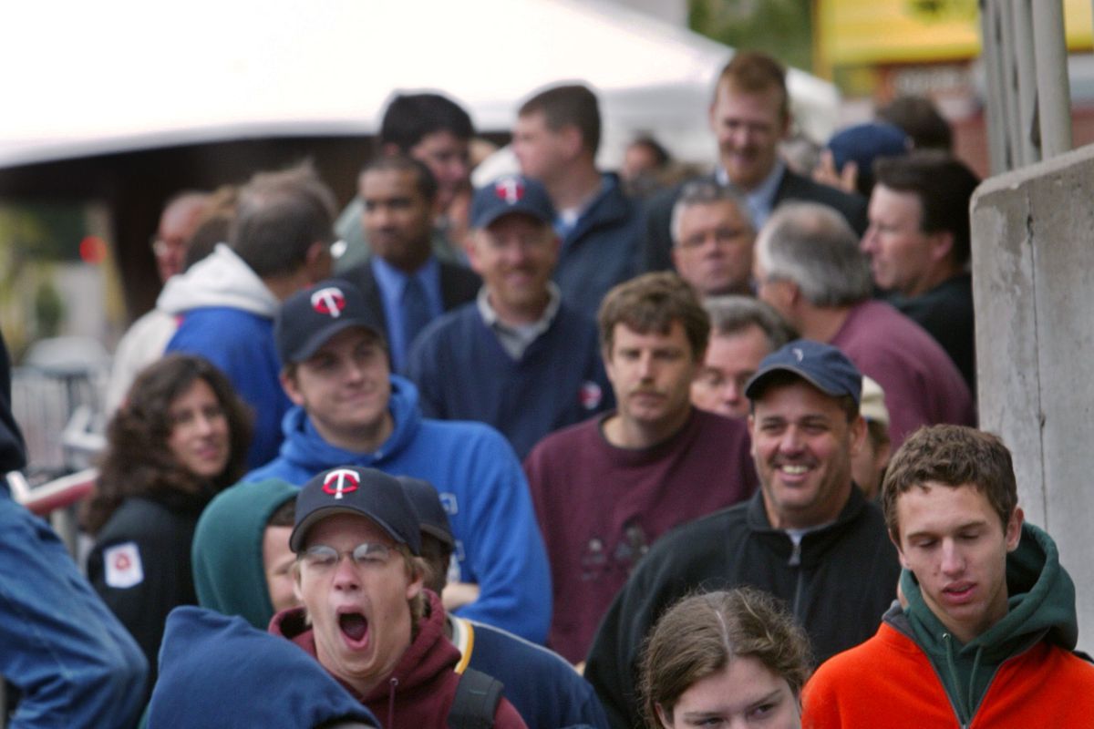 9/26/-03 Minneapolis, MN -Twins fans line up outside the Metrodome Friday morning waiting for tickets to go on sale for the upcoming American League Division Series playoff games against the Yankees.