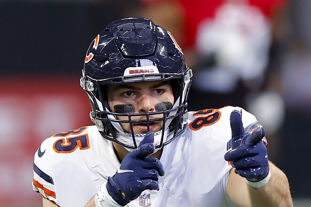 Cole Kmet #85 of the Chicago Bears reacts after a catch during the first half against the Atlanta Falcons at Mercedes-Benz Stadium on November 20, 2022 in Atlanta, Georgia.