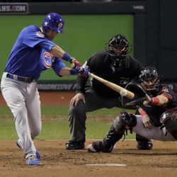 Chicago Cubs' Ben Zobrist watches his RBI-double against the Cleveland Indians during the 10th inning of Game 7 of the Major League Baseball World Series Thursday, Nov. 3, 2016, in Cleveland. 