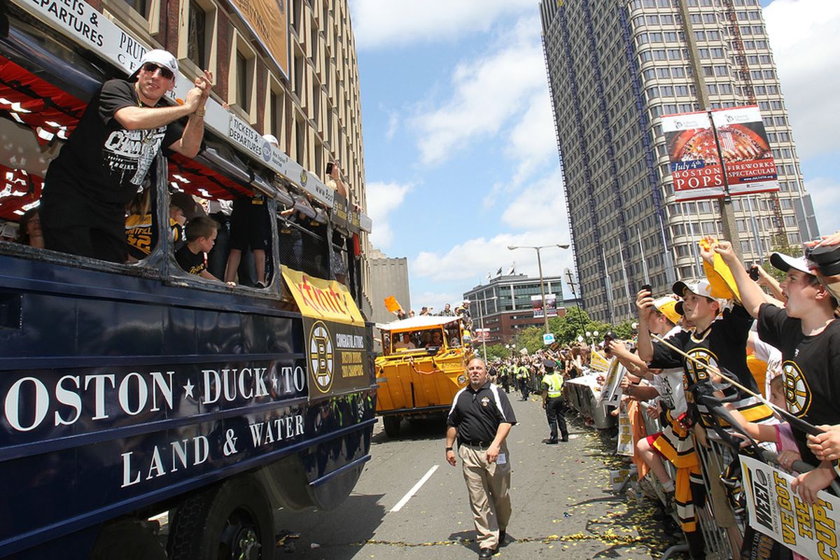 BOSTON, MA  - JUNE 18:  Brad Marchand of the Boston Bruins reacts to cheers during a Stanley Cup victory parade on June 18, 2011 in Boston, Massachusetts.  (Photo by Jim Rogash/Getty Images)