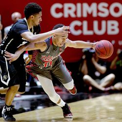 Utah Utes guard Brandon Taylor (11) steals the ball from Colorado Buffaloes guard Dominique Collier (15) that started a 19-0 run against the Buffaloes at the University of Utah's Huntsman Center in Salt Lake City on Saturday, March 5, 2016.  