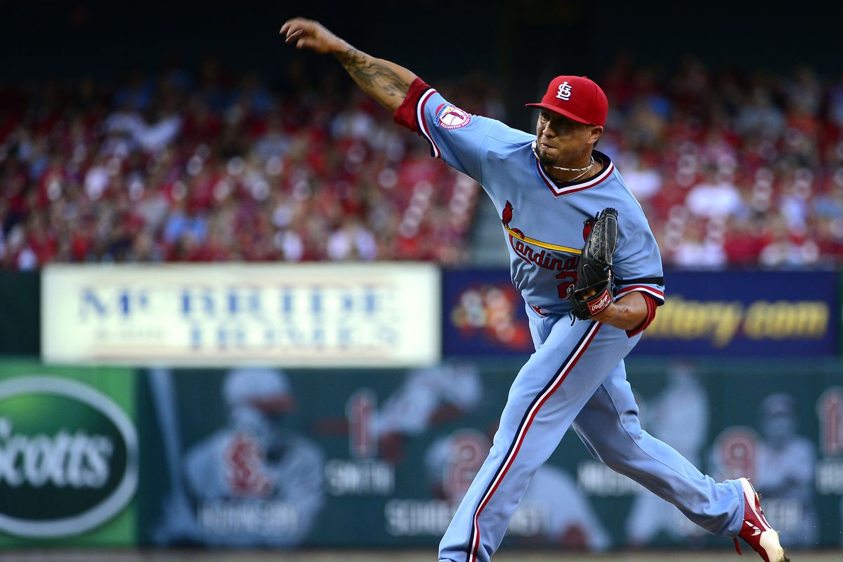 Aug 5, 2012; St. Louis, MO, USA; St. Louis Cardinals starting pitcher Kyle Lohse (26) delivers a pitch against the Milwaukee Brewers during the first inning at Busch Stadium. Mandatory Credit: Scott Rovak-US PRESSWIRE