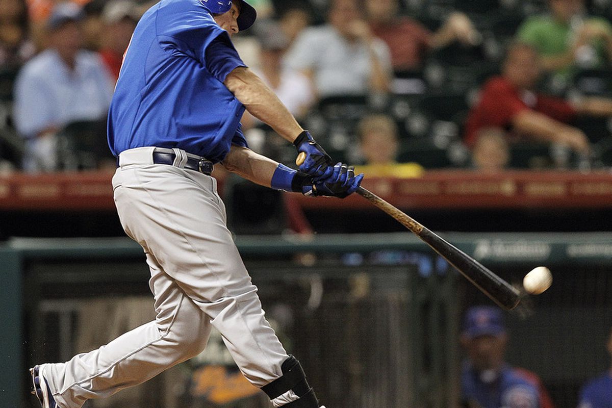 Blake Lalli of the Chicago Cubs singles in the ninth inning scoring two runs against the Houston Astros at Minute Maid Park in Houston, Texas.  (Photo by Bob Levey/Getty Images)