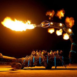 A scorpion created by Kirk Jellum cruises through the Burning Man festival in 2011.  A large-scale kinetic sculpture of a praying mantis that was created by Jellum was purchased by the owner of Zappos.com, an online shoe and apparel shop.  Photo/ Ian Lauder