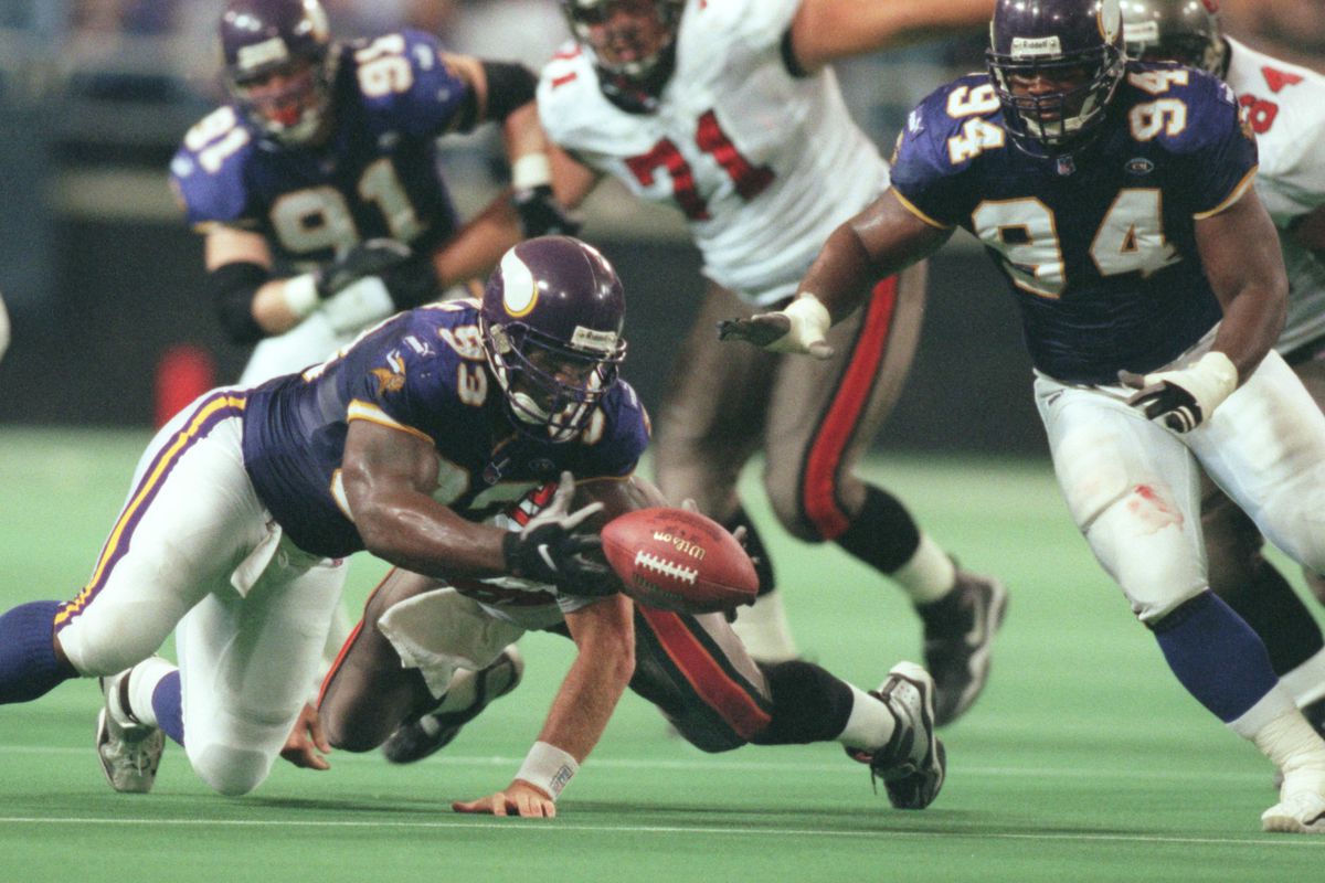Oct. 3	-Tampa Bay - Minnesota Vikings — Minneapolis Mn, Sunday 10/3/99 Vikings vs Tampa----Vikings John Randle scopes up a Trent Dilfer fumble that he caused early in the 4h quarter as his teamate Tony Williams looks on.