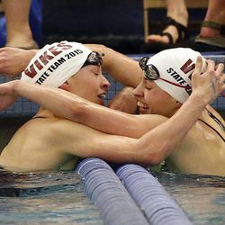 Mariah, left, and McKenna Gassaway of Viewmont hug following the 100-yard breaststroke during the 5A state swimming championships in Provo Friday, Feb. 13, 2015. McKenna won.

