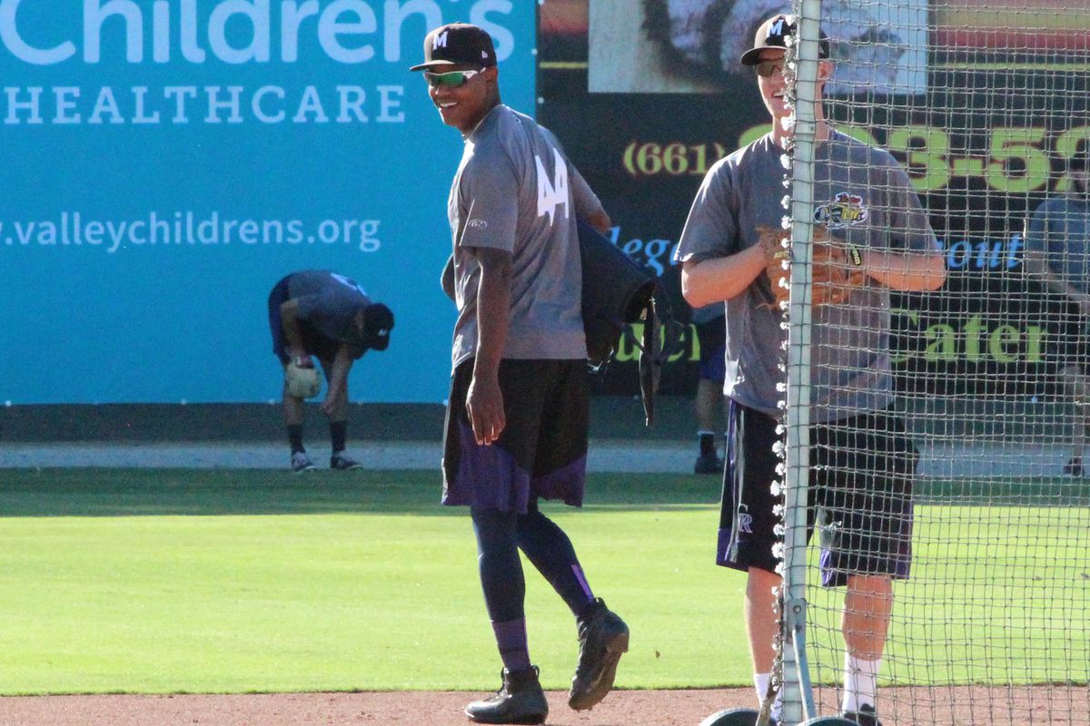 Yency Almonte is all smiles during a recent Modesto Nuts BP session.