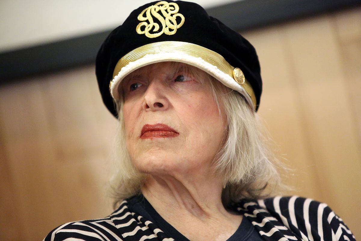 A woman wearing a hat 
